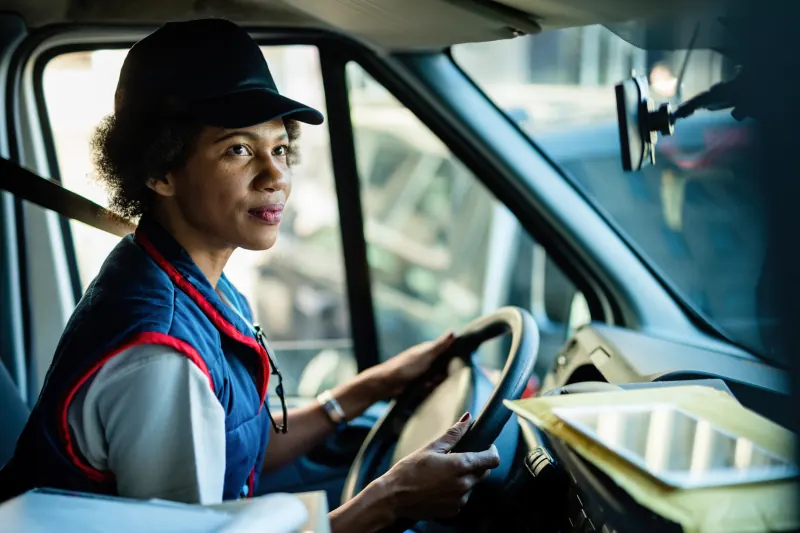 Delivery driver at the wheel of a van